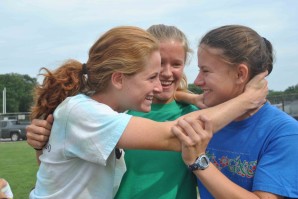 Seniors Bridget Maloney, Courtney Ackerman, and Claire McCain goof around during cross-country practice. (Horner) Seniors Bridget Maloney, Courtney Ackerman, and Claire McCain goof around during cross-country practice. (Horner)